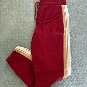 Fabletics Adult Burgundy Joggers with Tan & White Side Stripes